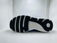 Under Armour Charged Assert 9 running Shoes (414)
