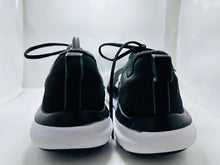 Under Armour Charged Assert 9 running Shoes (414)